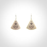 Hand carved New Zealand mother of pearl drop, Koru earrings hand made by Kerry and Amanda Thompson. One only large Koru earrings. Real New Zealand Mother of Pearl art to wear. Free Shipping worldwide.